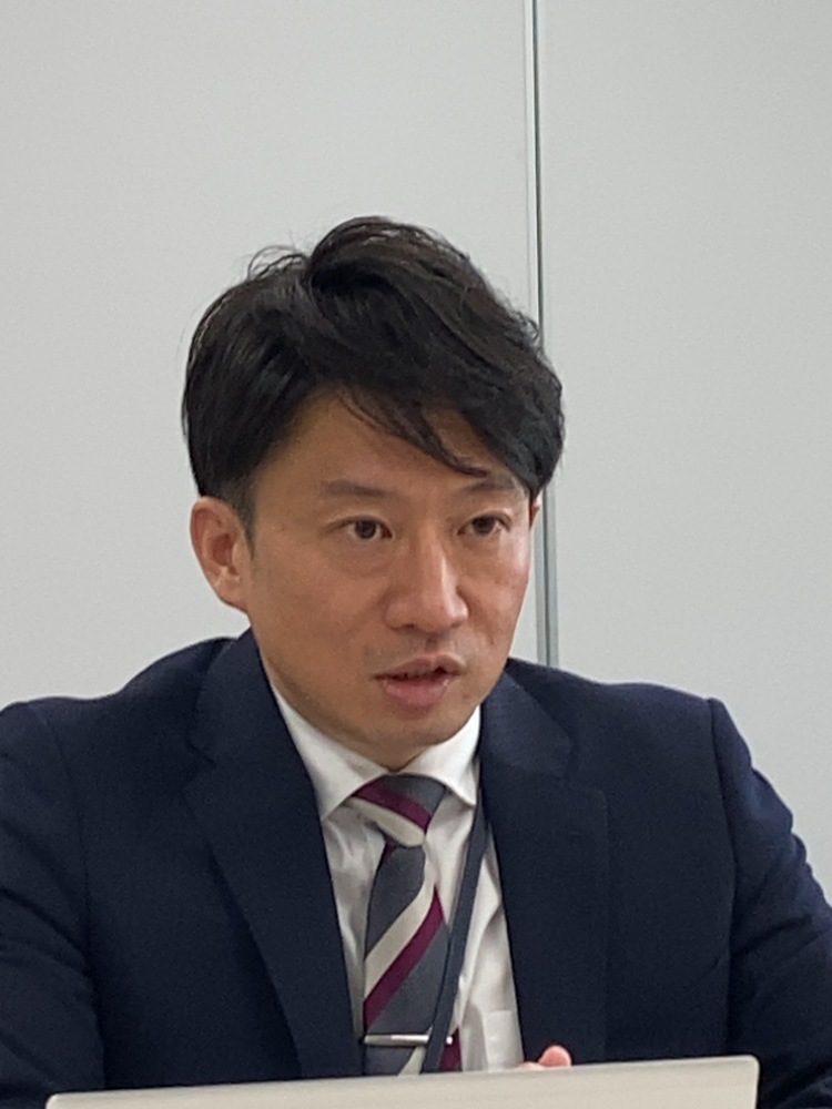 田中課長