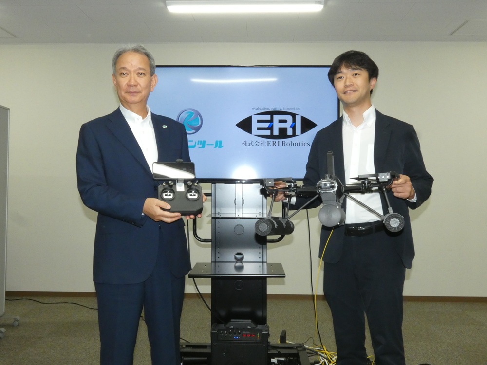 小川社長（左）と藤本代表